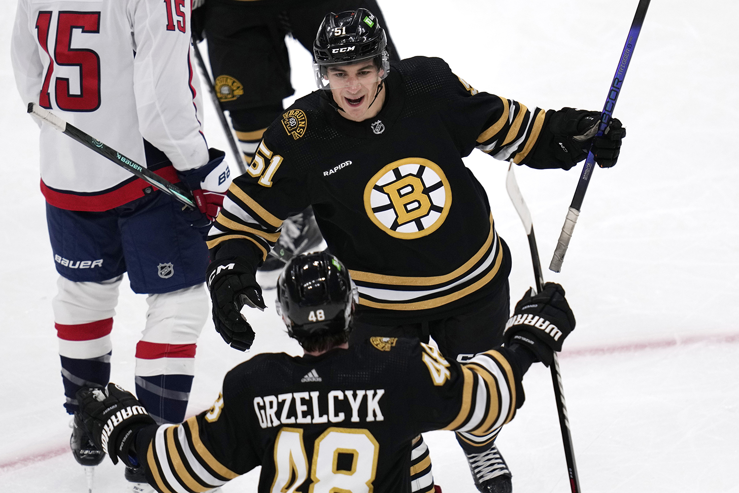 Bruins beat the winless Sharks 3-1 for their 3rd straight win to open the  season