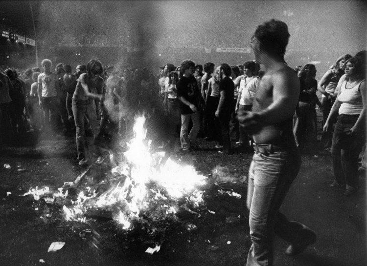 People set records on fire at Disco Demolition night in Chicago in 1979. 