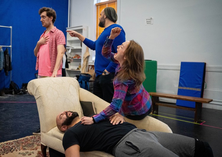 Cast members of "The Play That Goes Wrong" work in Portland Stage's rehearsal hall. Front: Khalil LeSaldo* and Laura Darrell*; Back: Dean Linnard* and Nicholas Mongiardo-Cooper* (*Member of Actors Equity Association)
